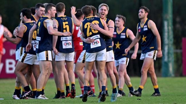 EDFL: Essendon Doutta Stars players celebrate after the siren. Picture: Andy Brownbill