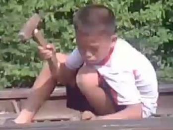 FEE APPLIES - FOR NEWS.COM.AU story only - Footage obtained by the Mirror shows children being forced to do hard labour in North Korea. Picture: Mirrorpix
