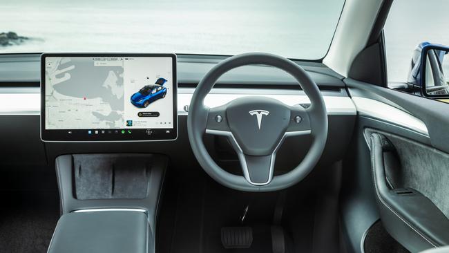 The Tesla Model Y has a plain-looking cabin with plenty of features.
