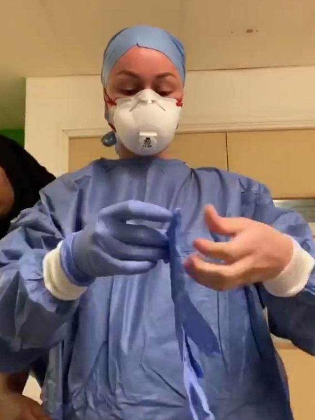 Australian nurse Kathryn Lennon dons her personal protective equipment in preparation for her shift in a London hospital’s ICU. Picture: https://www.instagram.com/_kathrynlennon/