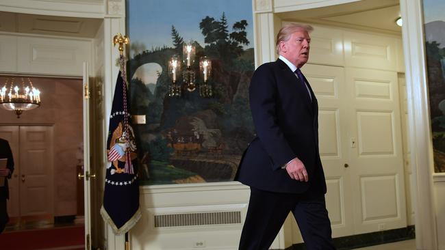 President Trump walks in to speak at the White House. Picture: AP