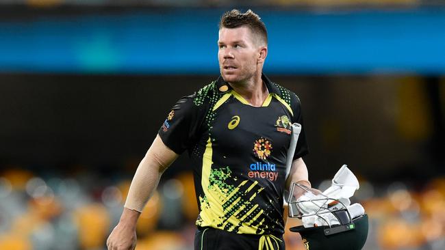 BRISBANE, AUSTRALIA - OCTOBER 07: David Warner of Australia looks dejected after being dismissed during game two of the T20 International Series between Australia and the West Indies at The Gabba on October 07, 2022 in Brisbane, Australia. (Photo by Matt Roberts/Getty Images)