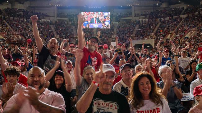 Trump supporters went wild in response to his speech after hours spent waiting for him. Picture: Getty