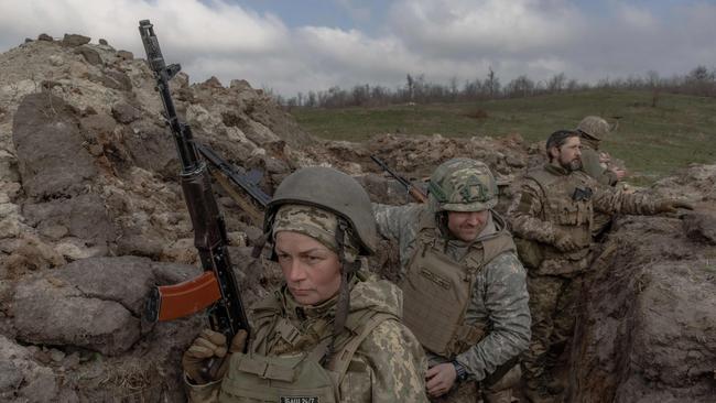 Natalia, 51, a mother of three, serves as a combat medic amid the Russian invasion of Ukraine. Picture: Roman Pilipey / AFP