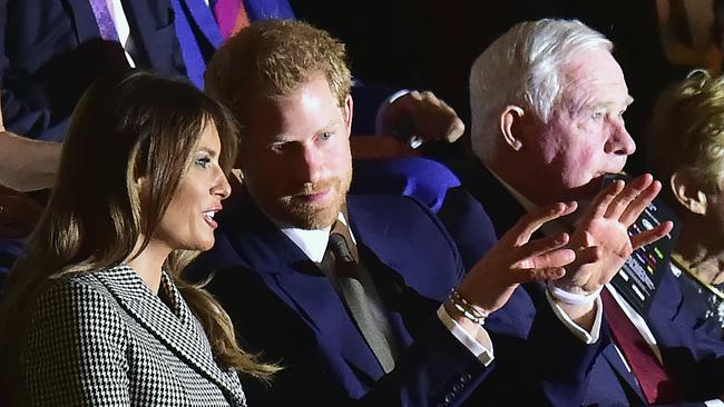 US first lady Melania Trump and Prince Harry sat together for the event. Picture: Frank Gunn / The Canadian Press / AP.