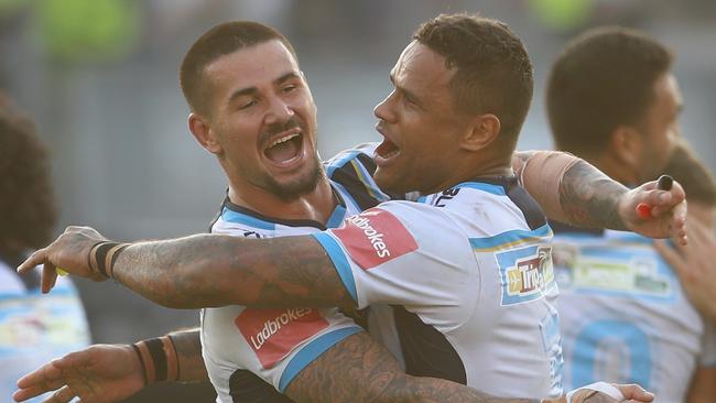 Nathan Peats celebrates with Josh Hoffman after a Titans win.