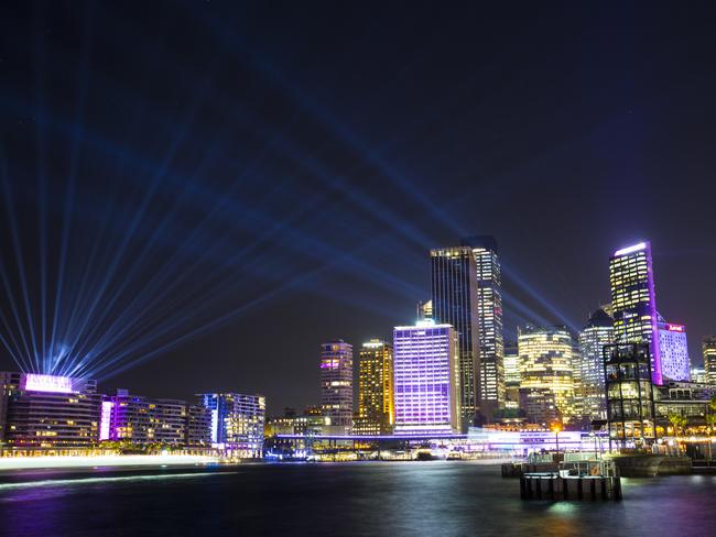 A laser show played out in the skies over the CBD. Picture: Damian Shaw