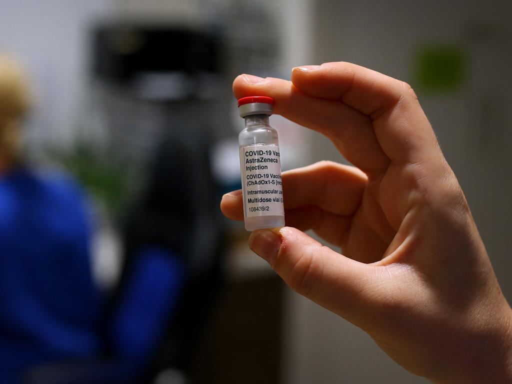 A nurse handles a COVID-19 AstraZeneca vaccine vial in Sydney. Picture: Lisa Maree Williams