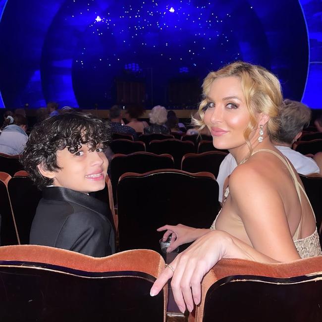 Clare and her young son were regulars at Sydney opening nights.