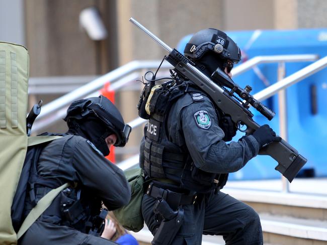 Sniper teams move into position as the siege unfolded.