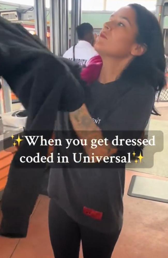 A woman was dress-coded as she tried to make her way inside one of the world’s biggest theme parks. Picture: TikTok/@mommashive