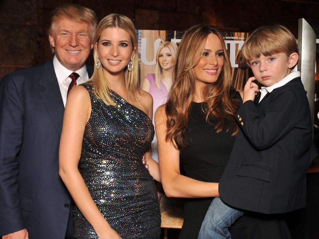 Donald Trump whith daughter Ivanka, son Barron and wife Melania at the launch of “The Trump Card: Playing to Win in Work and Life” on October 14, 2009 in New York City. Picture: Getty