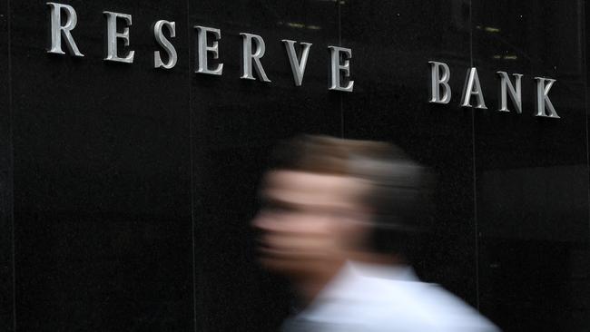 A pedestrian walks past the Reserve Bank of Australia (RBA) building in Sydney. Picture: AAP