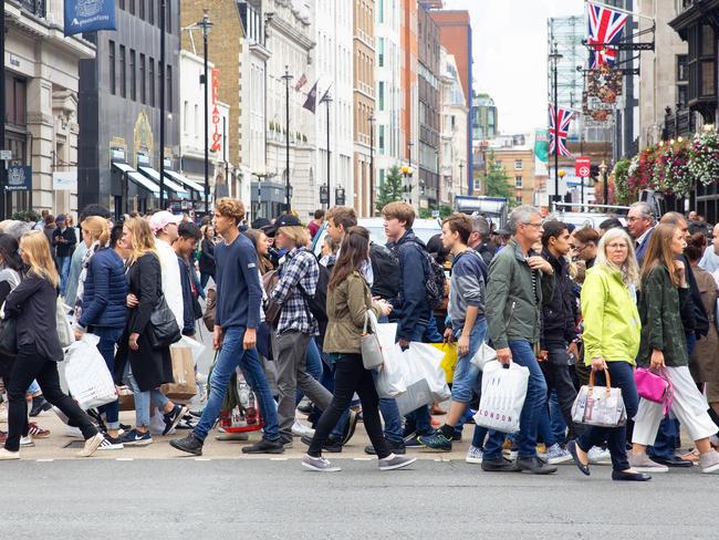 England London Oxford street pedestrians crossing street