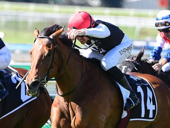 Glitter Strip, ridden by Ben Thompson, wins the 3YO Plate at Doomben on May 15, 2021. Picture: Grant Peters/Trackside Photography,