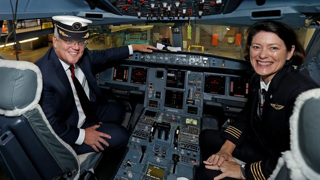 Scott Morrison and Qantas Pilot Captain Debbie Slade in the cockpit of an Airbus A330 at Sydney Airport on Thursday. Picture: Dylan Coker