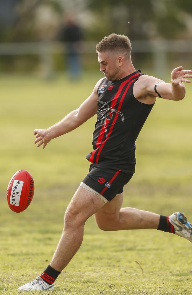 Shannon Henwood takes a kick for the Redbacks.