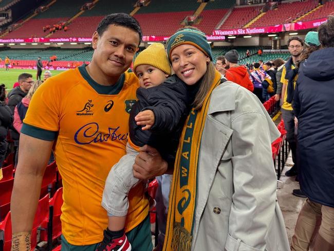 Wallabies centre Len Ikitau with son Lennox and fiancee Samantha De Flavis.