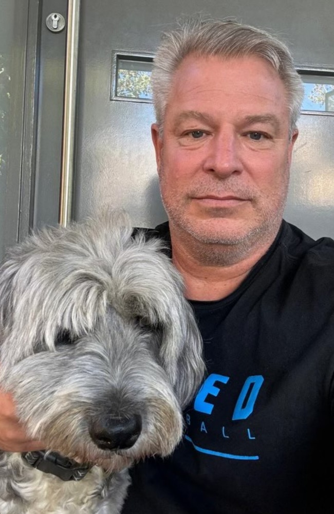 Melbourne United coach Dean Vickerman with his dog Jett.