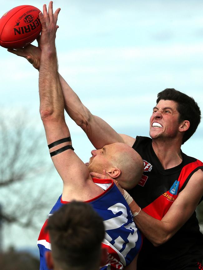 Will Hoare battling it out in the ruck against Keilor’s Andrew Browne in 2021. Picture: Hamish Blair