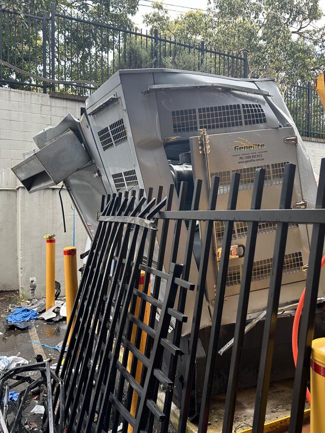 The generator was bent over a fence.