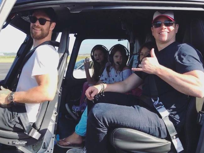 Matt Damon and his kids fly to Byron Bay to see Chris Hemsworth in style — via helicopter.