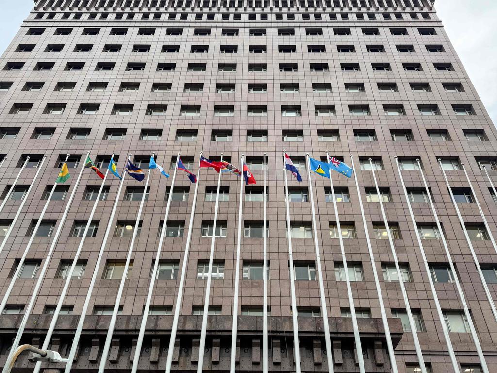 The national flag of Nauru is missing from its post (fourth right) at the diplomatic quarter where the Embassy of the Republic of Nauru is located in Taipei, Taiwan. Picture: Yan Zhao / AFP