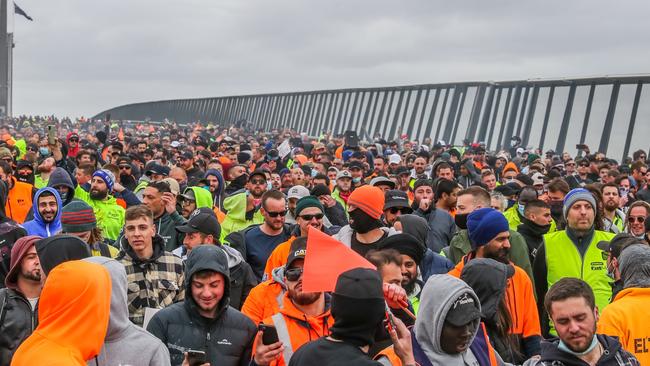 Crowds amass on Melbourne’s Westgate Bridge in September 2021, protesting over the introduction of mandatory vaccinations for construction workers. Picture: Getty Images