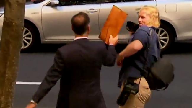 The star confronted AAP photographer Joel Carrett outside Downing Centre Local Court in 2019.