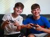 Ethan, 9, and Ryan Arnold, 13, at home, in Sans Souci, today. They play video games in the school holidays mainly and the parents say they have to finish their schoolwork before they spend time on the computer.
(Computer games story)
Picture:Justin Lloyd.