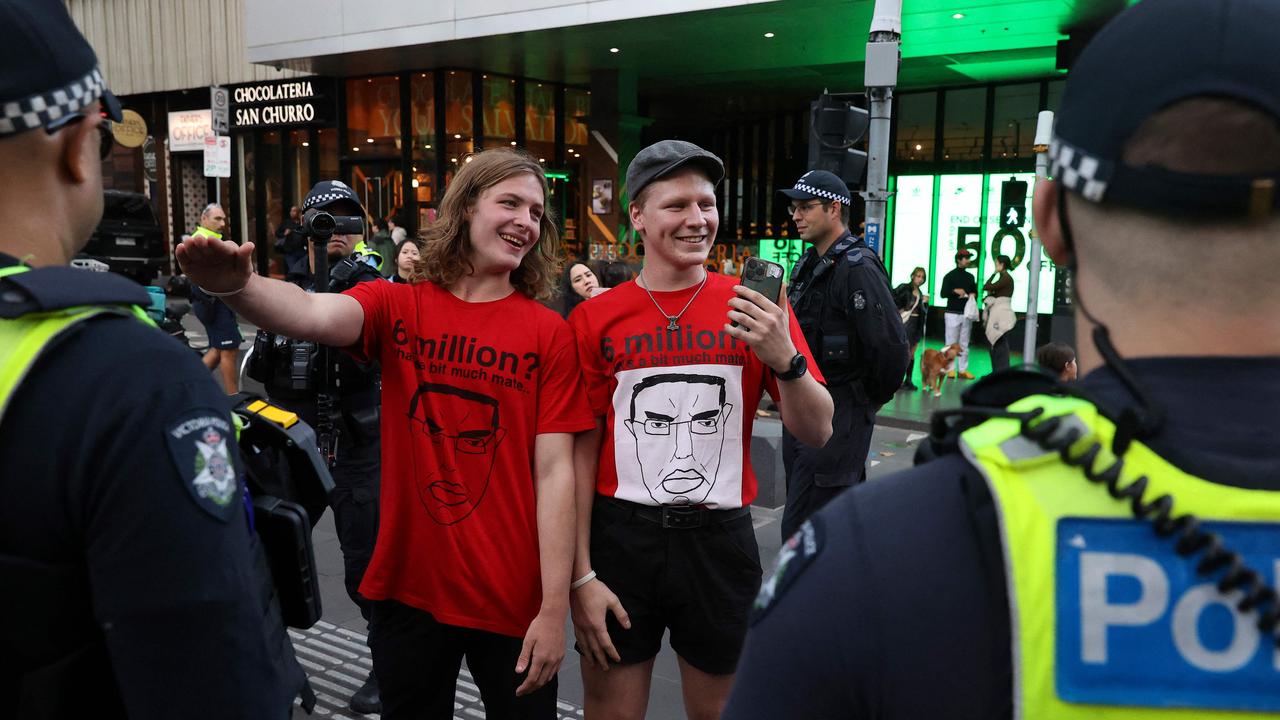 Two men who performed the Nazi salute were quickly moved on. Picture: Martin Keep