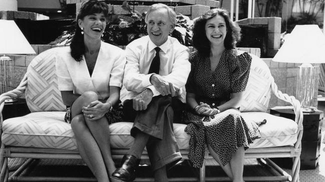 Then Federal Opposition Leader Andrew Peacock with two of his daughters Ann Nasser (L) and Caroline Peacock during federal election campaigning in Adelaide, February 1990.