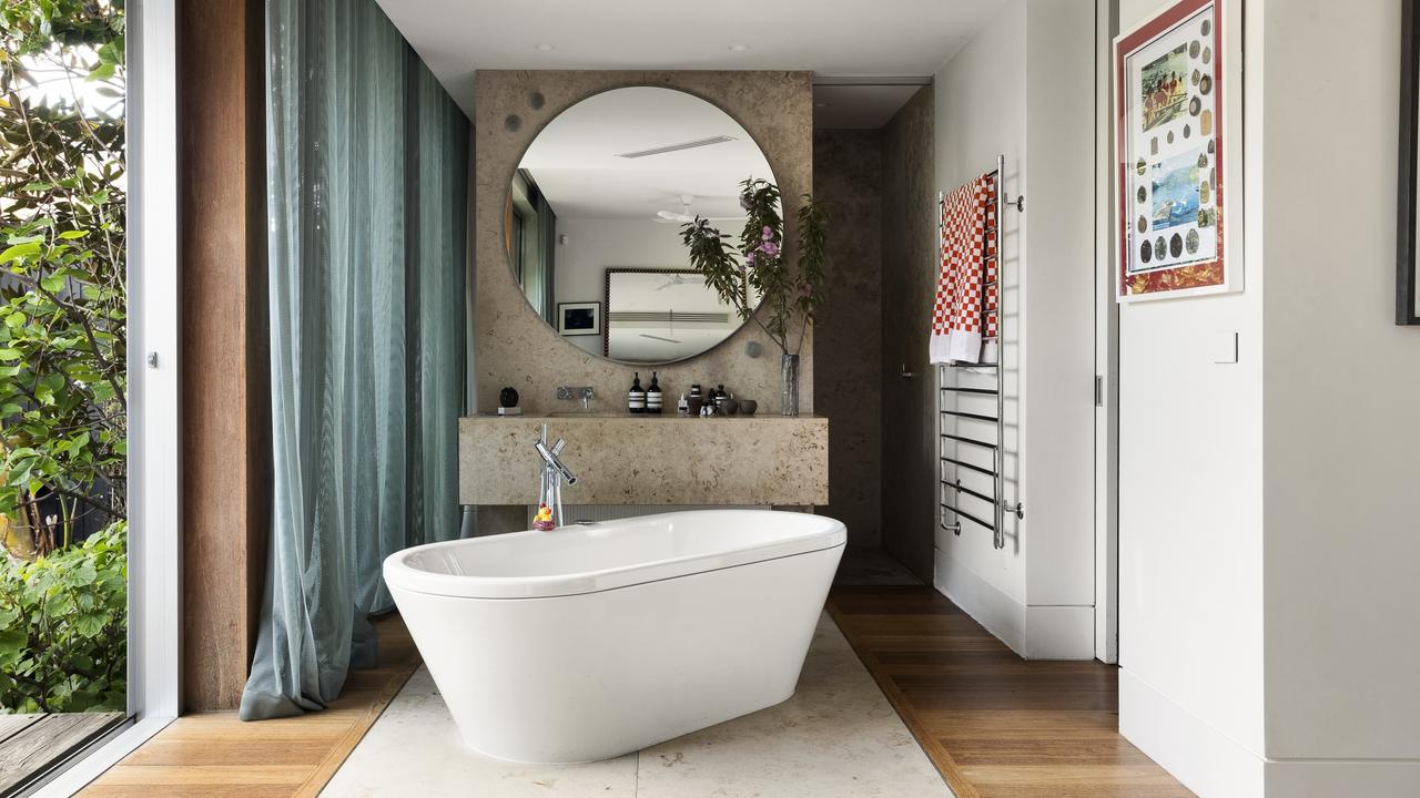 The freestanding bathtub apart of the main bedroom’s ensuite.