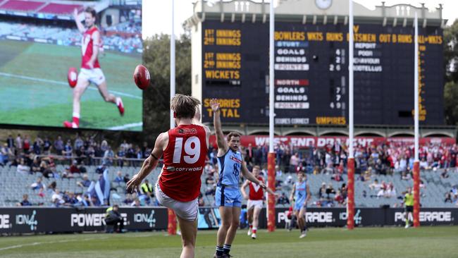 Lewis Hender slots a goal from near the boundary. Picture Sarah Reed