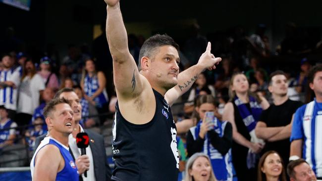 MELBOURNE, AUSTRALIA - MARCH 29: Brendan Fevola, Carlton Hall of Famer, participates in the half time Kick for the Kids activation during the 2024 AFL Round 03 match between the North Melbourne Kangaroos and the Carlton Blues at Marvel Stadium on March 29, 2024 in Melbourne, Australia. (Photo by Dylan Burns/AFL Photos via Getty Images)