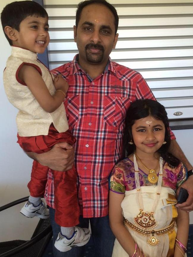 Immanuel George, 4, with father George Panicker and sister Ruana George, 10.