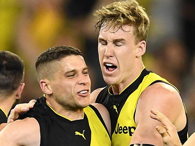 MELBOURNE, AUSTRALIA - SEPTEMBER 20: Dion Prestia of the Tigers is congratulated by team mates after kicking a goal during the AFL Preliminary Final match between the Richmond Tigers and the Geelong Cats at Melbourne Cricket Ground on September 20, 2019 in Melbourne, Australia. (Photo by Quinn Rooney/Getty Images)