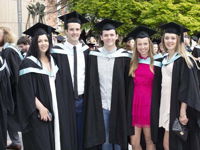 Irini Alexiou, Brad Tuffin, Charlton Store, Lily Czeszek and Gabrielle Brown at the UTAS Graduation at Launceston. PICTURE CHRIS KIDD