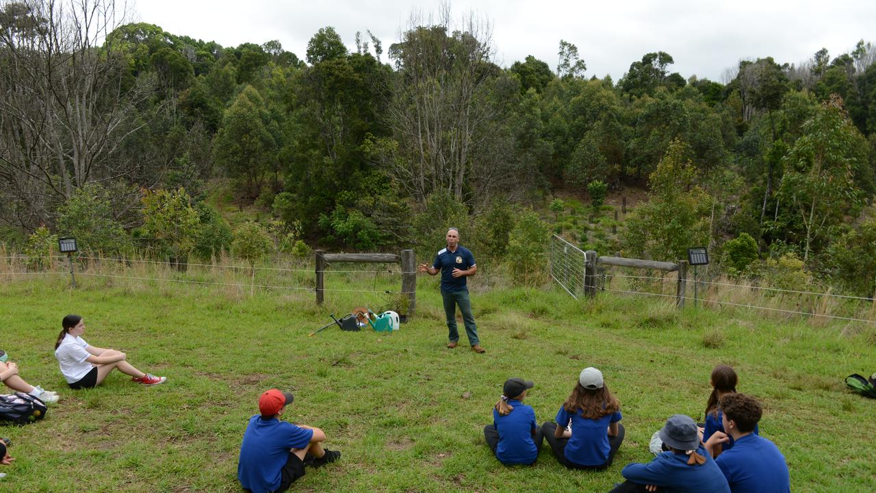 Mullumbimby High School teacher Max Binkley speaks to students at his property as part of the new project, Trees for Koalas - Connecting Communities. The project is aimed at increasing the number of koala food trees on private properties within the Byron Shire. The group toured a Binna Burra property on Tuesday, October 27, before planting 400 new koala food trees to build upon existing plantation works. Picture: Liana Boss