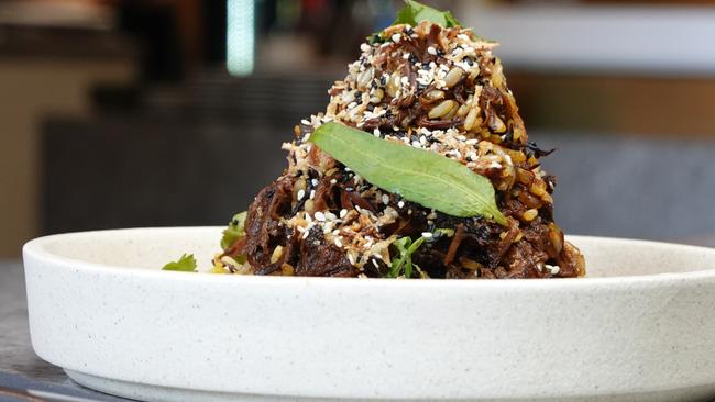 Dig beneath the lemongrass beef rib pile to find a refreshing salad. Picture: supplied