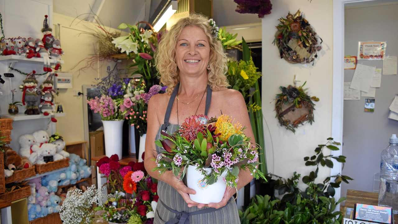 Christmas blooms for floral art workshop | The Courier Mail