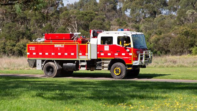 Fire trucks at a grass fire in Jells Park, Wheeler's Hill. Picture: Sarah Matray