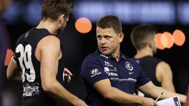 Brendon Bolton chats to Dale Thomas. Picture: Michael Klein