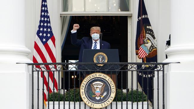 Donald Trump appears at the White House on October 10 for the first time since testing positive for the virus. Picture: AFP