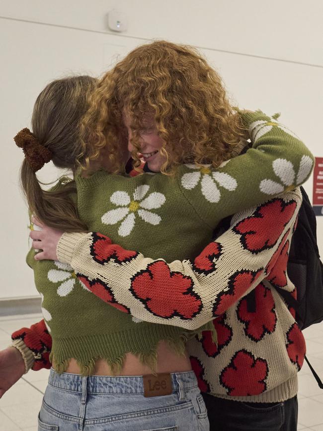 The siblings hug after his return from Milan Fashion Week. Picture: Matt Loxton