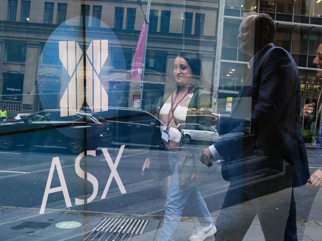 SYDNEY, AUSTRALIA - Newswire Photos October 24, 2022:Members of the public are seen walking past the ASX in Sydney ahead of the Budget announcements. Picture: NCA Newswire / Gaye Gerard