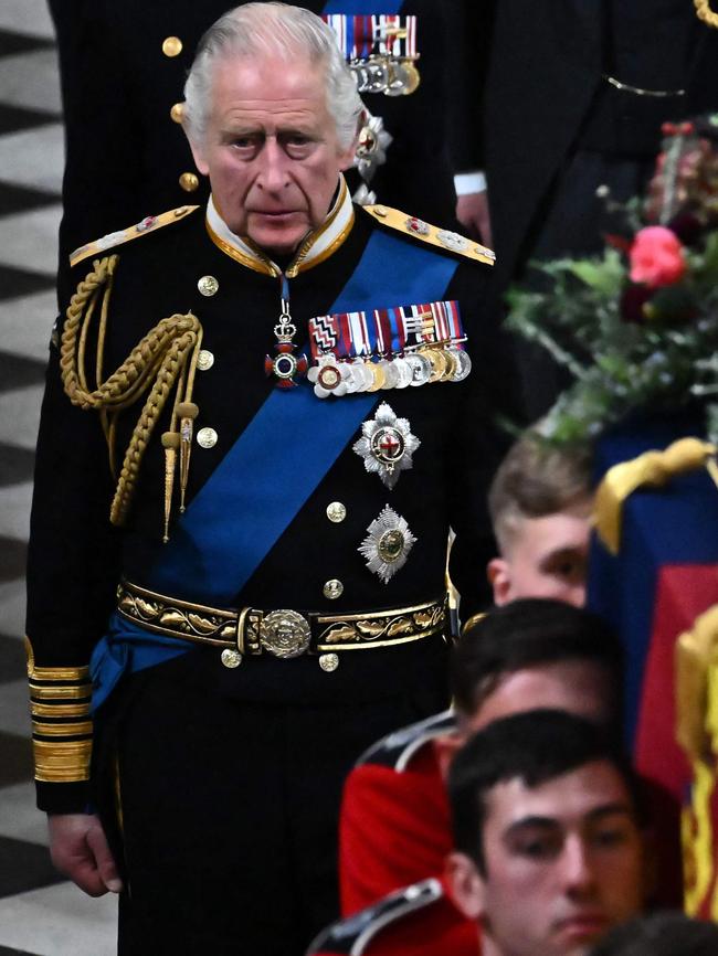 King Charles III walks beside the coffin of Queen Elizabeth II. Picture: AFP