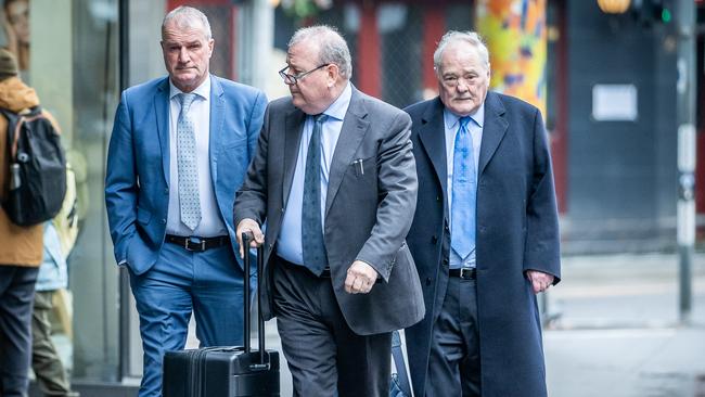 Darren Weir (left) arrives at the penalty hearing on Monday with his legal team. Picture: Jake Nowakowski