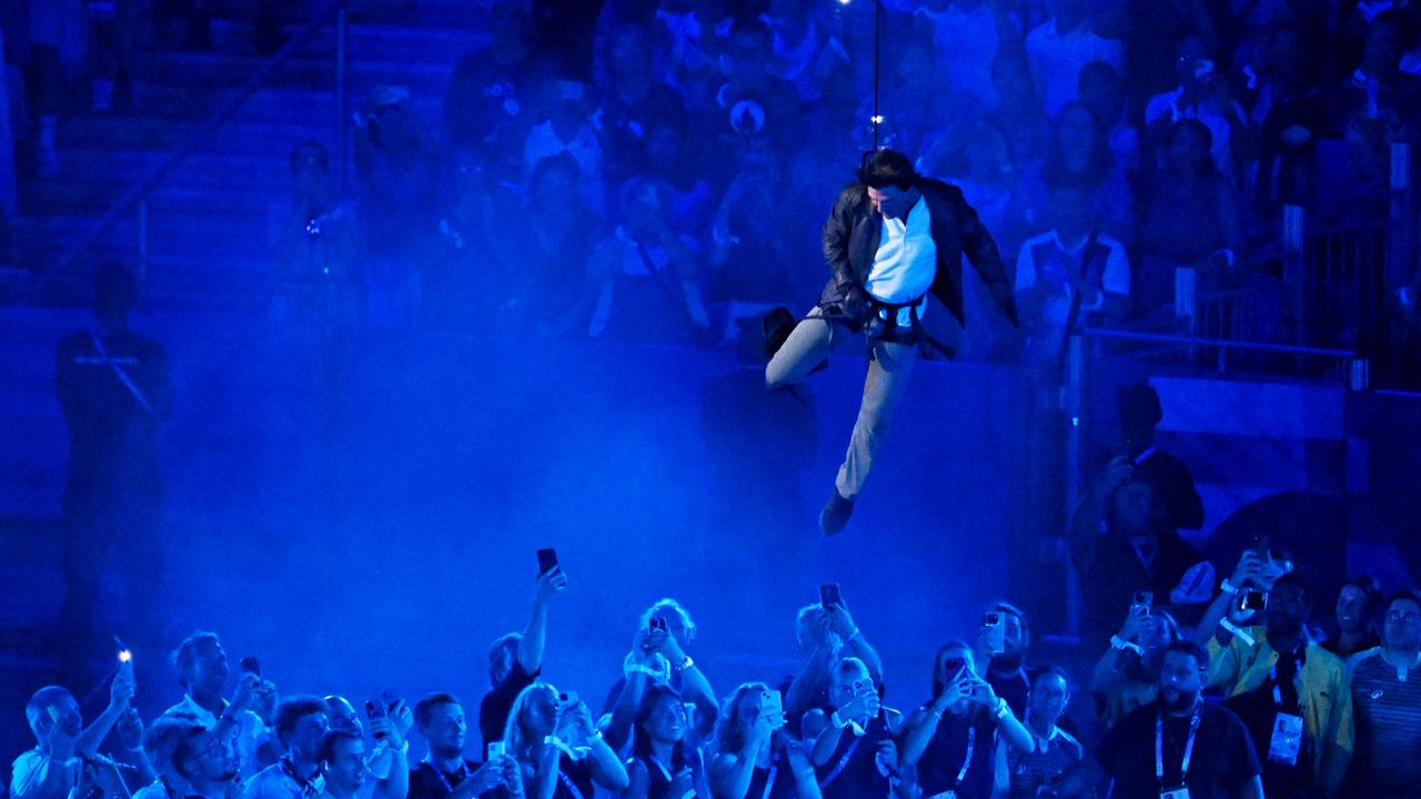 Cruise jumped off the roof of the stadium. (Photo by Andy Chua-Pool/Getty Images)