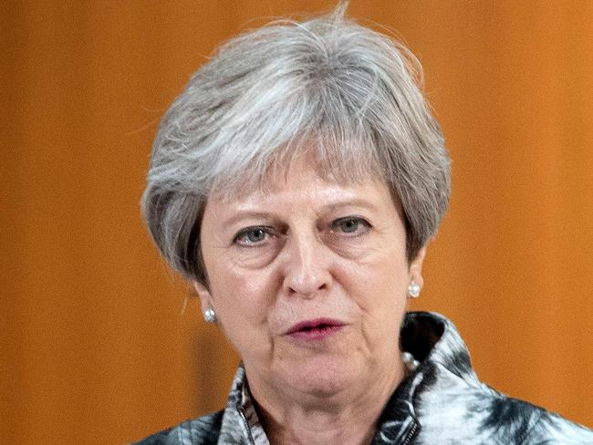 Britain's Prime Minister Theresa May speaks before the signing of the Edinburgh and South East Scotland City Region Deal at the University of Edinburgh, Edinburgh on August 7, 2018.  / AFP PHOTO / POOL / Jane Barlow